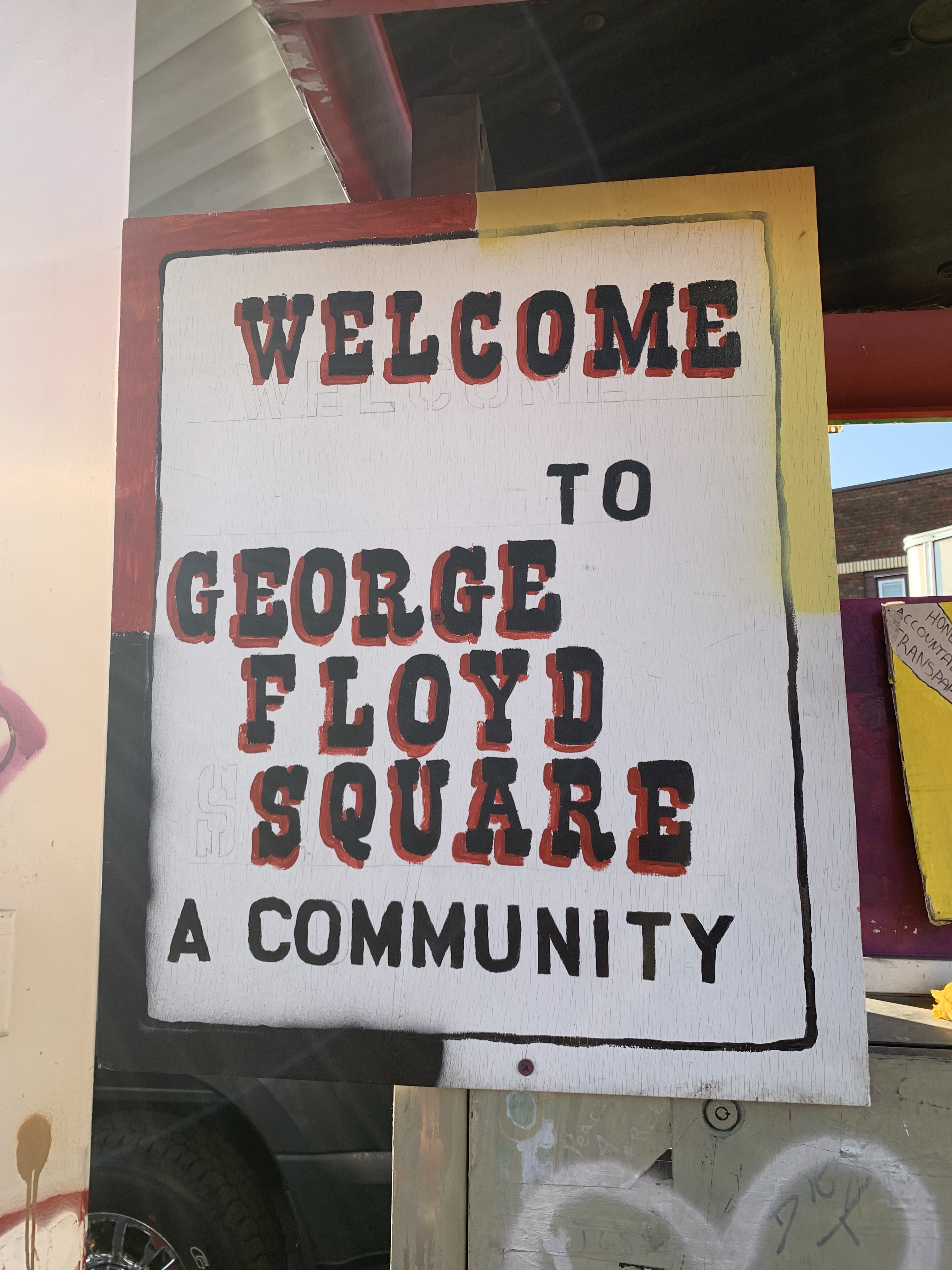 Sign that reads: Welcome to George Floyd Square, A Community