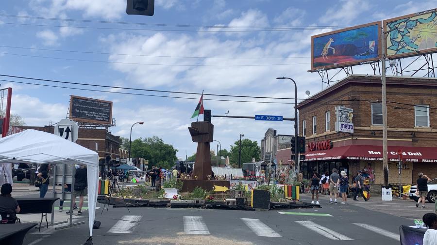 Image of the metal fist statue at 38th and Chicago.