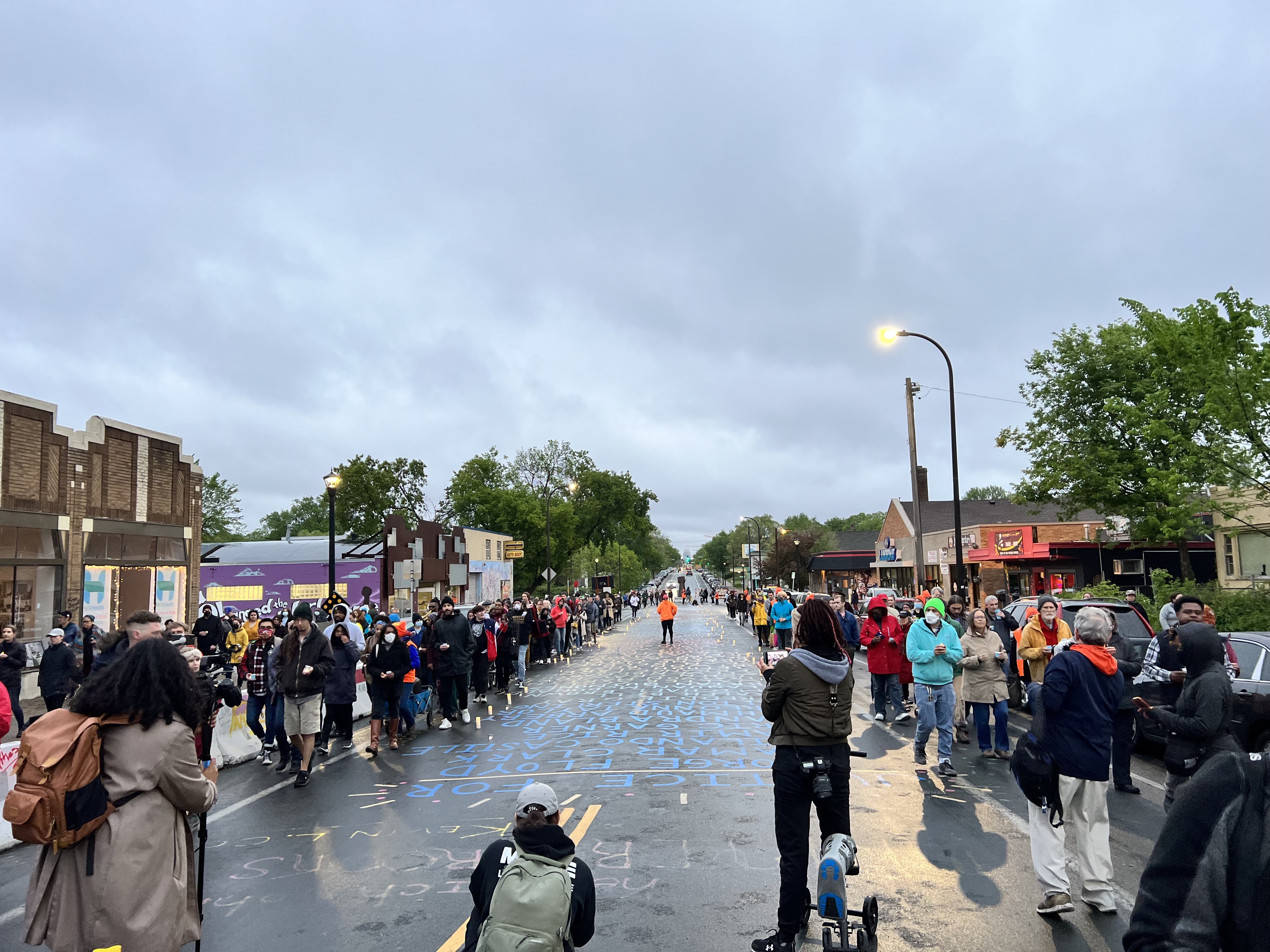 People march down 38th street.