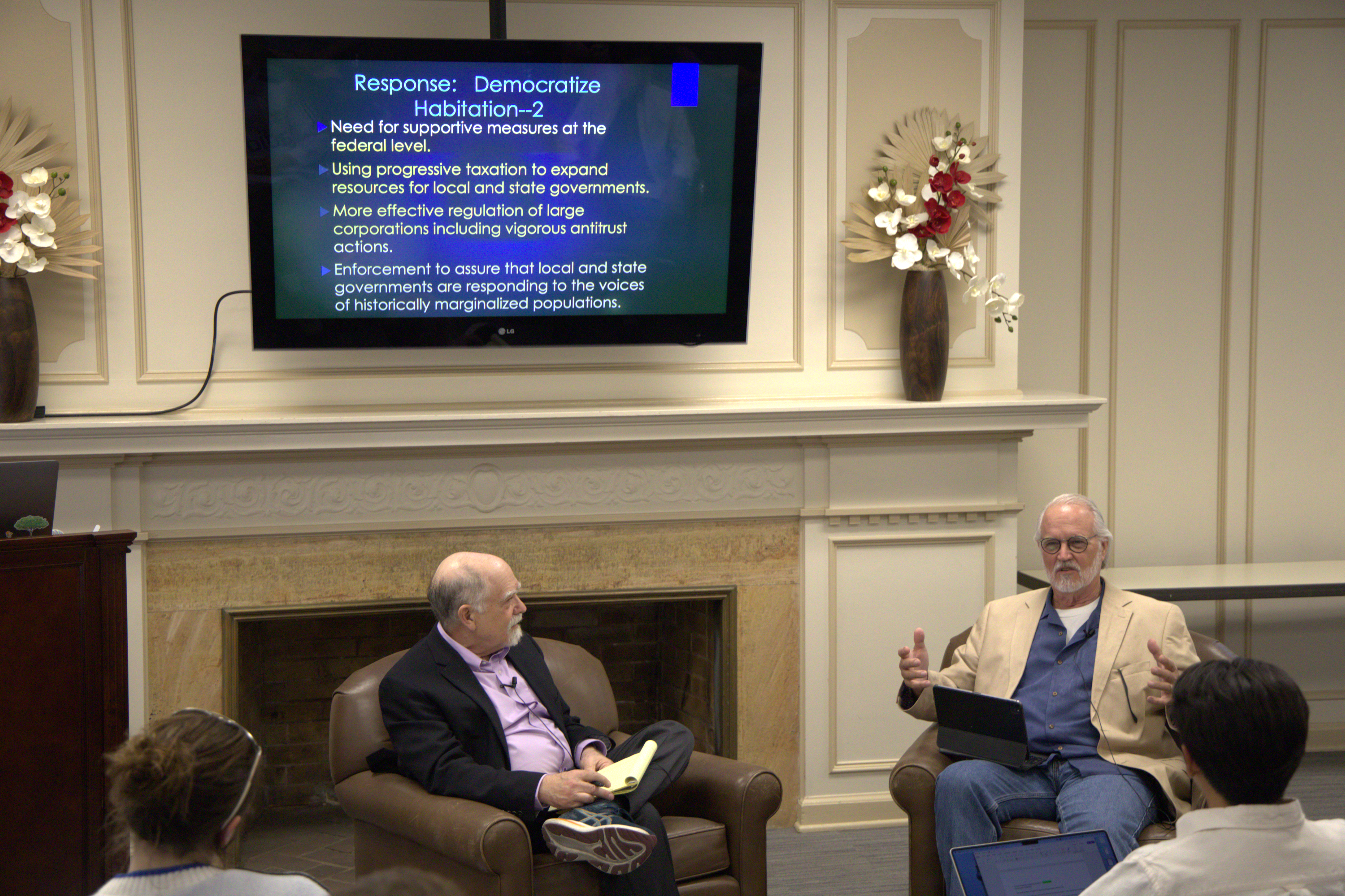 Fred Block and Craig Calhoun discuss in front of the audience.