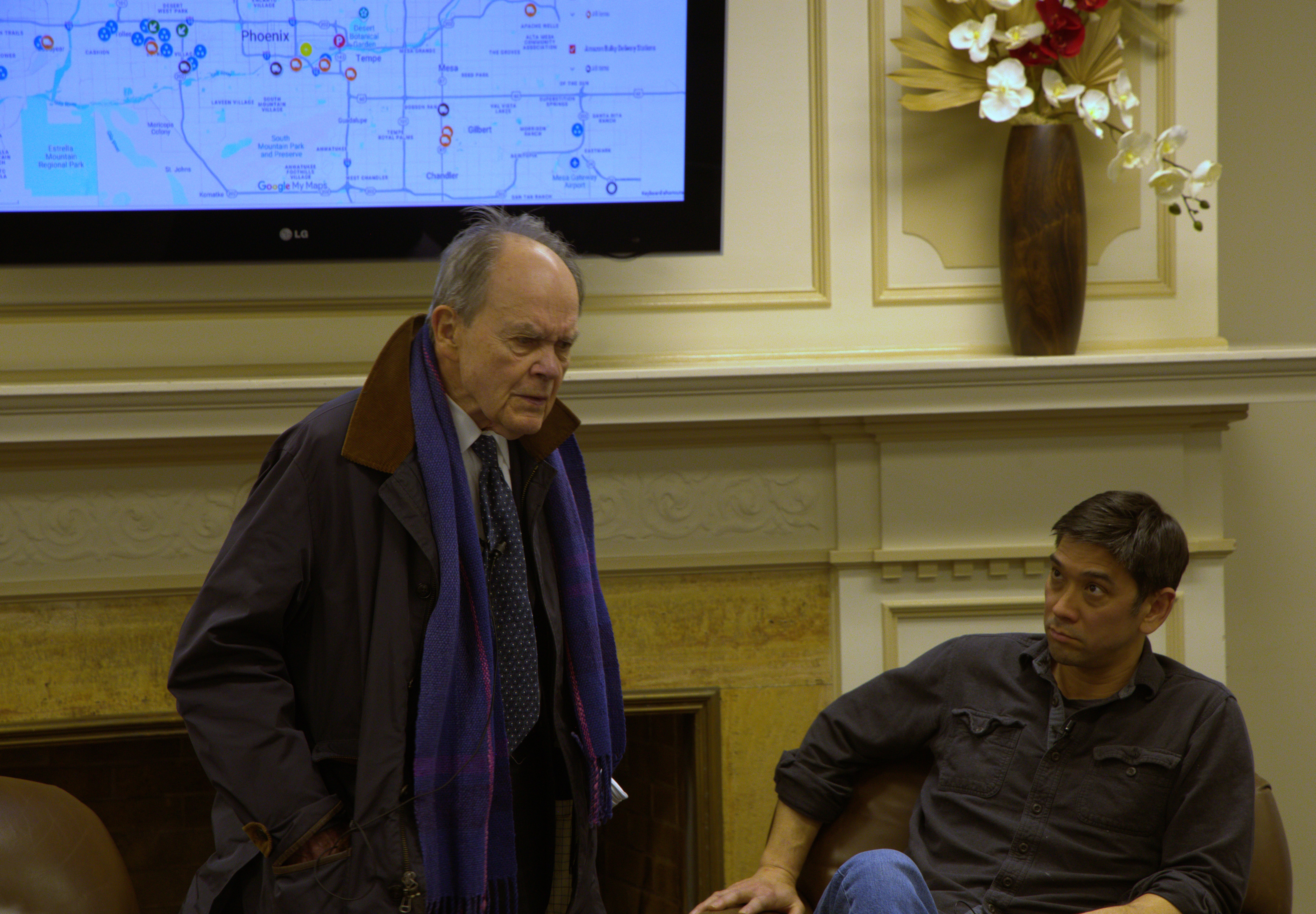 Womack stands to answer question with Ben Fong